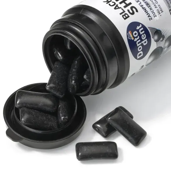 Жувальна гумка Dontodent Black Shine з активованим вугіллям та ксилітом 50 шт 4066447671438 фото